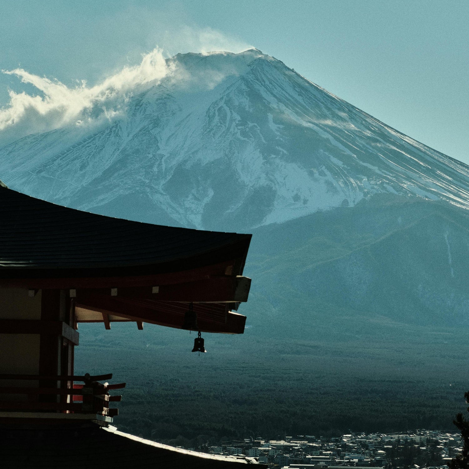 Japan Mount Fuji with a traditional Japanese building in the foreground and Koi in the distance